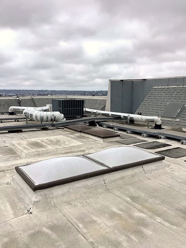 Rooftop package units on a commercial roof